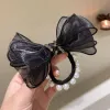 A new Korean version of fashionable lace bow hair tie, diamond knot, pearl hair band, bun hair and leather band hair accessory for women Item Picture